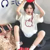 Diseño blanco de seda de leche con estampado de manzana, nueva camiseta popular de verano 2026 única y hermosa de manga corta para hombres y mujeres