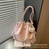 Bolso Cubo de Gran Capacidad Estilo Coreano para Mujer 2026 Nuevo Mochila Simple con Cordón para el Trabajo y el Ocio con un Toque de Lujo Bolso de Hombro