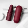 Sombrilla portátil de protección solar para mujer con logo personalizado, doble uso para días soleados y lluviosos, estilo cápsula, diseño minimalista, recubrimiento negro, sombrilla publicitaria