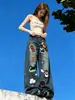 Trendy Carp tiene en stock jeans bordados de dibujos animados para mujer, nuevo estilo de otoño, de cintura alta, holgados, adelgazantes, de pierna ancha, largos hasta el suelo