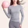 Otoño Invierno Lyocell Tencel Ropa de Yoga Cálida Adelgazante Casual Versátil Cálido Deportes Manga Larga Mujer Fábrica de Origen