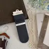 Calcetines apilados de estilo coreano para mujer 2026, divertidos, de color liso, diseño simple, imitación de dos piezas con volantes de encaje, a media pantorrilla, en negro y blanco lechoso