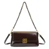 Bolso de Hombro tipo Silla Nuevo Retro Versátil Otoño e Invierno 2025 Diseño de Nicho Bolso Cruzado de Cadena de Moda Bolso de Viaje