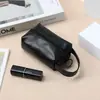 Nueva bolsa portátil de PU para labiales, bolsa de maquillaje, mini bolsa de almacenamiento para labiales, joyería, cable de datos y bolsa de almacenamiento para llaves