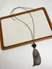 Nuevo collar colgante de pez de palisandro estilo chino, estilo étnico vintage, cadena larga versátil para suéter, accesorio de diseñador para mujer