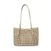 Bolsos de Mujer Transfronterizos 2026 Nuevo de Moda Casual para el Trabajo Estilo Coreano de un Solo Hombro Hueco Bolsos Tote de Gran Capacidad