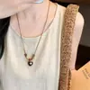 Nuevo Collar Largo Hueco Estilo Chino Forma de Gota de Agua para Mujer, Cadena de Suéter Retro de Lujo Ligero de Alta Gama, Accesorio Simple y Versátil para Cuello Halter