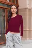 Camiseta hecha a medida, estilo europeo y americano transfronterizo, cuello redondo, manga larga, sin capucha, base de seda de leche, ropa interior de alta gama para mujer