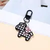 Chaveiro Acrílico Desenho Animado Fofo com a Frase "Fique Rico Logo" DIY para Bolsa de Menina Chave de Carro Acessório Decoração Materiais