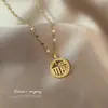 [Acero de titanio] Carácter Fu completo de diamantes oro 2021 cadena para la clavícula año micro incrustación collar de alta gama diseño de colgante femenino