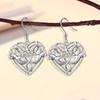Nuevo amor hueco moda colgante conmemorativo aretes personalizados creativos versátiles frescos nicho exquisitos aretes de regalo