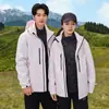 Nueva chaqueta outdoor de estándar nacional para hombres y mujeres, abrigo de senderismo tres en uno a prueba de viento e impermeable, ropa para montañismo y esquí con logotipo personalizado