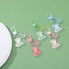 Colgante llavero de oso de resina color caramelo DIY accesorio de regalo cultural y creativo para bolsos, fundas de auriculares y decoraciones