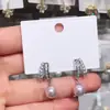 Aretes de Perla de Zirconia Aretes Únicos Estilo Nuevo Diseño de Personalidad de Nicho Aretes de Botón de Temperamento de Diosa Suave Colgantes