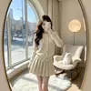 Conjunto de tricô cáqui para mulheres, novo look de inverno, um conjunto de duas peças composto por um top e uma saia