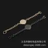 Roupa mais vendida casaco corrente de metal no pescoço liga galvanoplastia suéter costurado à mão corrente etiqueta com logotipo de letra côncavo-convexo