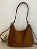 Mochila Nova Retro Outono 2026 Bolsa Tote Fashion para o Dia a Dia Bolsa de Mão Casual de Alta Qualidade Grande Capacidade Tendência