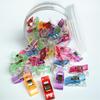 Exclusivo transfronterizo para hacha Hemming 50 colores blanco y rojo patchwork costura fija 2.7cm clip de plástico para lata de botella