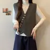 Elegante y chic chaleco de punto asimétrico con cuello en V para mujer, una nueva pieza casual de otoño/invierno que se puede combinar fácilmente con suéteres y otras prendas superiores.