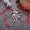 Festival del Bote del Dragón zongzi pulsera tejida a mano estilo nacional cuerda roja cuerda colorida aleación conejo pulsera de mano pequeños regalos al por mayor