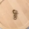 Venta caliente europea y americana transfronteriza anillo de llavero redondo de bronce antiguo cierre de langosta accesorios de llavero chino vintage