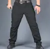 Calça de trabalho tática de comércio exterior transfronteiriço para entusiastas militares, calça de trabalho externa masculina de verão leve com múltiplos bolsos e durável, em estoque para atacado