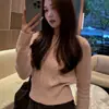 Suéter rosa de intrincado patrón de ganchillo estilo coreano para mujer, otoño e invierno, ajuste ceñido, adelgazante, de longitud corta, manga larga