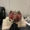 Bolsa Saco Moda Estilo Coreano 2026 Primavera Nova Moda Bolsa Transversal Xadrez Bolsa de Mão Casual Simples de Alto Valor