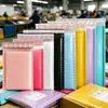 Ventas directas del fabricante: Bolsas de burbujas de colores, bolsas de embalaje para express engrosadas a prueba de golpes y resistentes a la presión, bolsas para express de película coextruida con película perlada