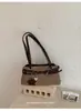Bolso de hombro retro transfronterizo para mujer, nuevo bolso Boston de nicho de alta gama, elegante bolso de mano y bolso de hombro para la ciudad
