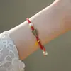 Pulseira de Corda Vermelha Trançada com Pingente de Cabacinha do Ano Zodiacal da Marca Fu para Mulheres Imitação de Jade Hetian Pérola Pulseira Fu Lu Joia Presente de Aniversário