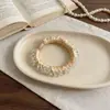 Diadema elástica plisada de satén suave estilo coreano con adornos de cristal, creando un look atmosférico, adecuada para coletas altas y moños