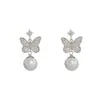 Brincos de Zircônia Borboleta Pérola Moda Versátil Exquisito de Nicho, Elegante Leve Luxo Doce Simples Super Fada Brincos Atacado
