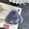 Pingente de chaveiro de carro de alta qualidade feminino Coreia do Sul criativo fofo celebridade da internet ins boneca de pelúcia coelho pingente de mochila escolar