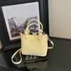 Bolso de mano de alta gama para mujer 2026 nuevo de moda otoño casual moda de oficina bandolera bolso cruzado tipo cubo