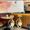 Pendientes de Aro Espiral con Circonita Zirconia Ultra-Hada Bañados en Oro Real Tacto de Alta Gama Cuentas Rojas Doble Gota de Agua Diseño de Nicho Ganchos para Oreja