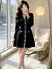 Vestido de Punto de Manga Larga Ajustado Estilo Nuevo Otoño/Invierno 2026 para Ir al Trabajo, Suéter Elegante para Abrigo Vestido Negro Pequeño