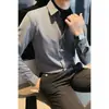 Camisa de Primavera e Outono masculina de manga comprida listrada falsa de duas peças versátil estilo coreano business casual leve madura simples