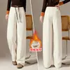 Pantalones de lana de pierna ancha color albaricoque para mujer, nueva colección otoño/invierno 2026, de tiro alto, mezcla de lana y acetato, pantalones casuales con una silueta fluida y curva