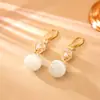 Venta Caliente Elegante Temperamento Ojo de Gato Circonia Ganchos para Orejas Moda de Gama Alta Exquisitos Pendientes Largos Pendientes de Atmósfera para Mujeres