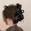 Elegante Pinza de Agarre Negra con Lazo de Cuero Estilo Hepburn para Mujer 2025 Nuevo Pinza de Tiburón de Gama Alta Adorno para el Cabello