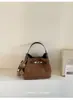 Bolso de Mano de Nicho Estilo Coreano Nuevo y Elegante para Mujer, Bolso Cubo de Comercio Exterior Versátil para el Trabajo, Bolso de Hombro Único Cruzado de Alta Apariencia