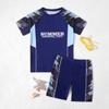 Traje de baño para niños más vendido Verano Nuevo Estudiante Natación Simple Atractivo Traje de baño Niño Dividido Manga Corta Traje Transfronterizo