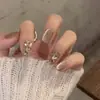 Armadura de mano sentido avanzado hecho a mano ins explosiones diamante roto mariposa uña piezas de uña al por mayor uñas portátiles