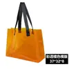 Bolsa de regalo promocional, bolsa transparente, bolsa de exposición de PVC, bolso de mano de moda, bolso de hombro único láser, blanco lechoso, verde claro, azul