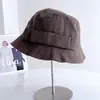 Sombrero de pescador con lazo estilo coreano para mujer, sombrero de cubo versátil casual de otoño para protección solar que hace que la cara se vea más pequeña, adecuado para un look natural