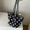 Bolso de mano grande de capacidad simple y elegante 2026 verano nuevo moda casual bolsa de trabajo de un solo hombro bajo el brazo