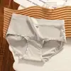 Ropa interior de seda de leche para mujer, lindo de cintura media, color liso, sin costuras, transpirable, antibacteriano, con fuelle extendido, bragas de triángulo para niña