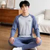 Conjunto de ropa interior básica de manga raglán con bloques de color para niños de otoño 26 juvenil Lyocell cuello redondo ropa para el hogar conjunto de dos piezas