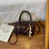 Bolso de Mano Boston Nuevo Otoño 2026 Moda y Simple Bolso de Hombro de Alto Valor para el Trabajo y los Viajes Bolso Almohada Tendencia